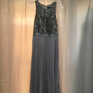 Formal/wedding guest attire with gold accents